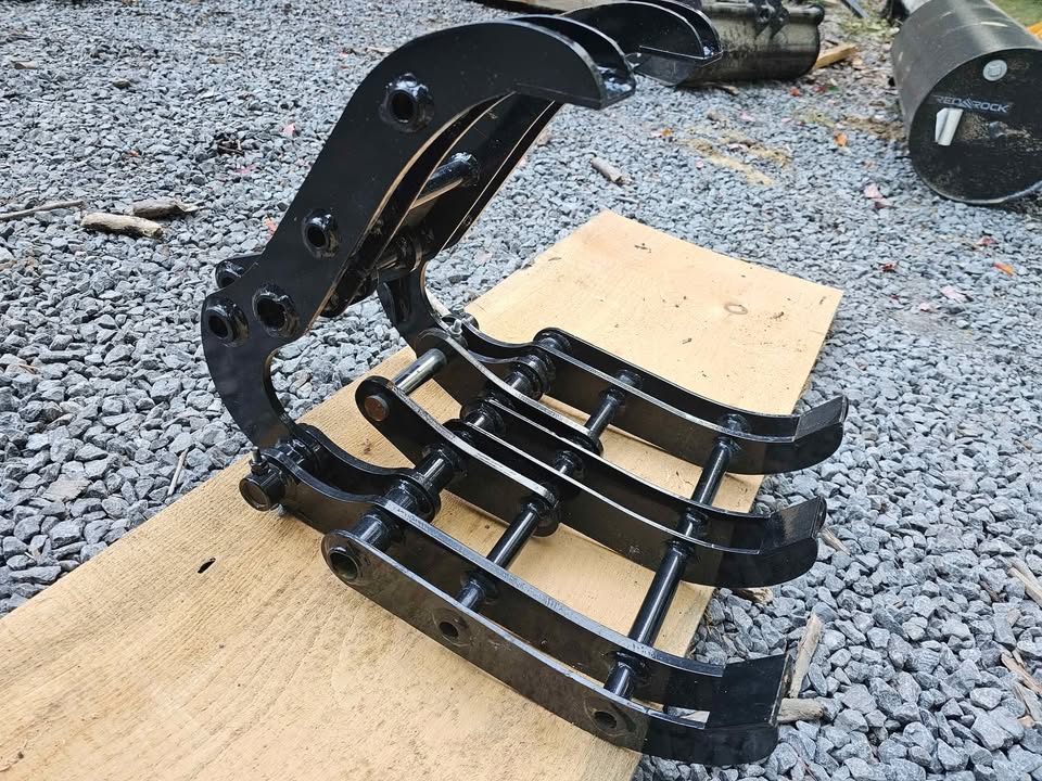 Mini-excavator grapple attachment